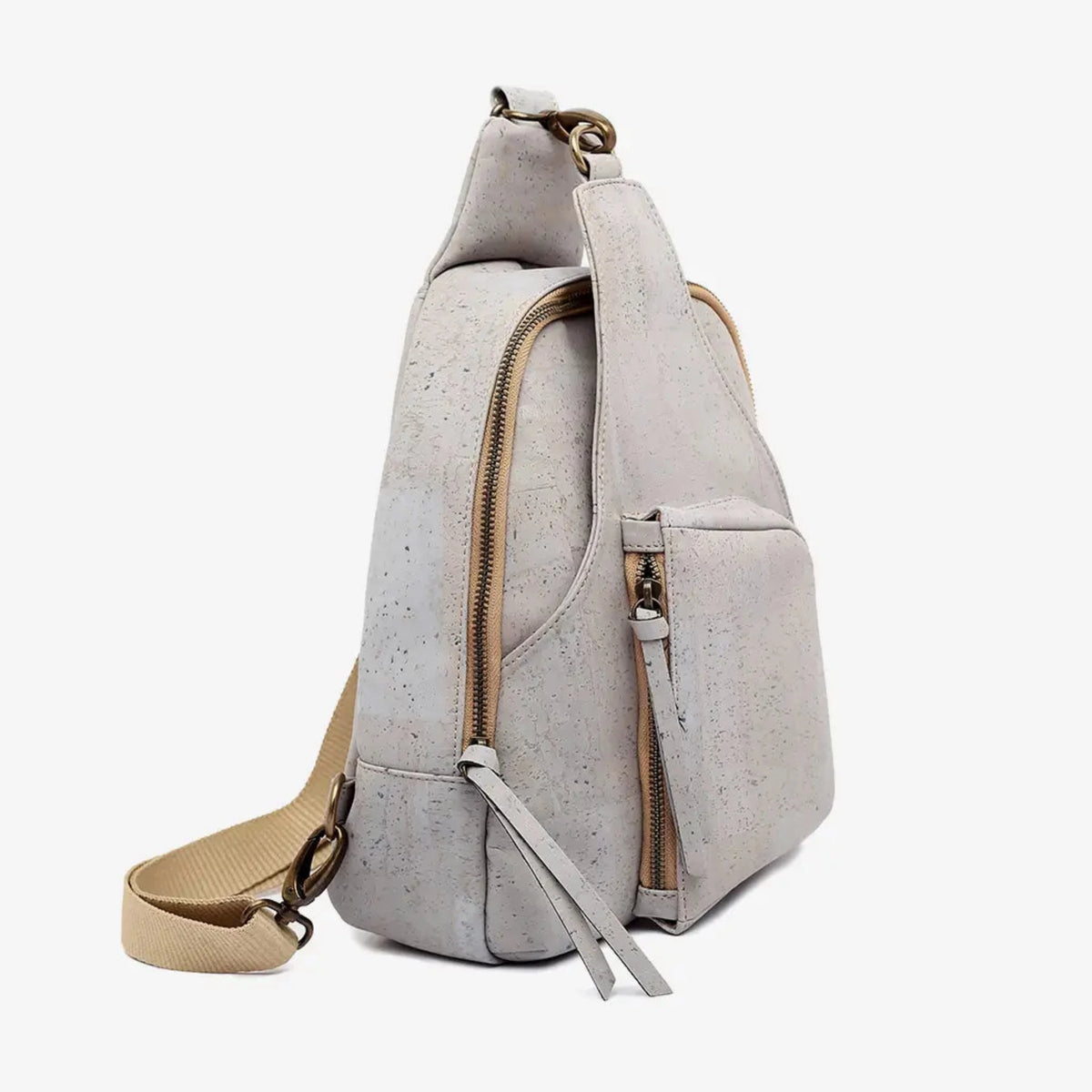 Der Rucksack / Crossbody aus Kork passt zu jedem Outfit und jeder Gelegenheit. Mit seinem minimalistischen Design und nachhaltigen Materialien ist er ein echter Hingucker und ein Statement für eine grüne Zukunft.